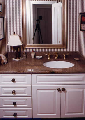 Private Residence, Hillsborough. This vanity is made of a stone that is no longer readily available, Golden Juperana. The category of granites known as Juperanas are typified by fine to medium grain crystals that swirl and "move". This group of stones is often appealing to people looking