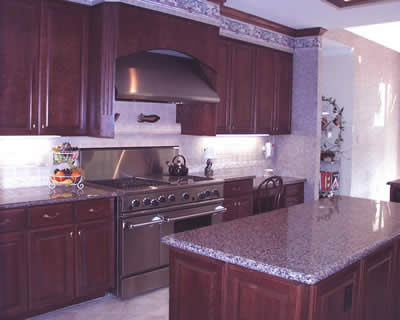 Private Residence, Raleigh. Violetta granite was used for the counters in this kitchen and creates a rich, elegant feeling. The highlights in the Violetta are burgundy/cranberry.