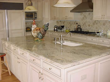 Private Residence, Chapel Hill. This Chapel Hill residence features Golden Beach granite in the kitchen. Golden Beach, quarried in Brazil, is extraordinarily unpredictable in its composition and is reminiscent of marble. This stone has accents of smoky, topaz quartz which make it quite 