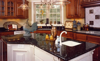 Private Residence, Wake County. These countertops were constructed with beautiful Verde Butterfly granite, which is quarried in Brazil. The house, built by Olde Heritage Homes, was a first-place winner in the Raleigh/Wake Parade of Homes.