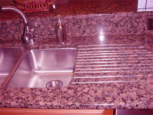 Private Residence, North Raleigh. An integral grooved drainboard was specified by this client who says it is a great feature of this kitchen and used regularly.