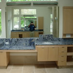 Private Residence Blue Bahia granite, very rare and quarried from boulders in Brazil, was specified for this Master Bath Retreat.  Note the varying levels of the vanities.  Prescott Stone collaborated closely with the cabinet and mirror shops to execute this design.