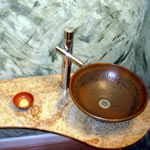 Private Residence, Durham In the vicinity of Duke University, this Powder Room underwent a transformation.  To complement the Juperana Fantastico granite, the customer commissioned a local artist to make the sink.  Prescott Stone rendered several designs for this tiny space and, u