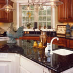 Private Residence, Wake County. These countertops were constructed with beautiful Verde Butterfly granite, which is quarried in Brazil. The house, built by Olde Heritage Homes, was a first-place winner in the Raleigh/Wake Parade of Homes.