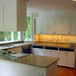 Private Residence, Chapel Hill This Chapel Hill couple upgraded from solid surface to New Venetian Gold granite.  The introduction of this jewel tone stone added visible warmth and interest to the space.