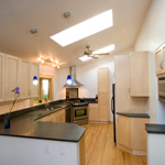 Private Residence Close collaboration with Town & Country Kitchens, Ltd. Was required on this job.  The goal was to detail this job in Duke Park to minimize the number of seams on the expansive counter. This was installed as essentially a seamless installation The stone, h